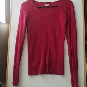 Red V-neck sweater